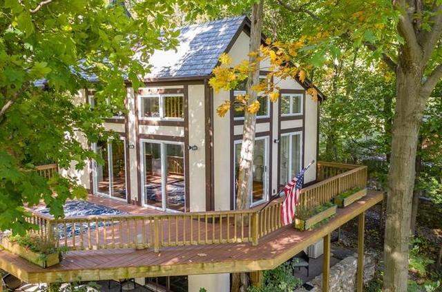 Elevated home with deck on stilts