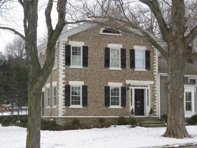 cobblestone home in winter