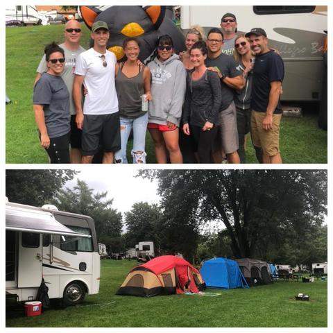 team camping and enjoying summer activities